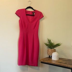 Body-conscious business dress.